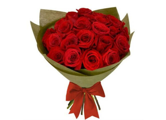 Bouquet of red roses tied with a big red ribbon