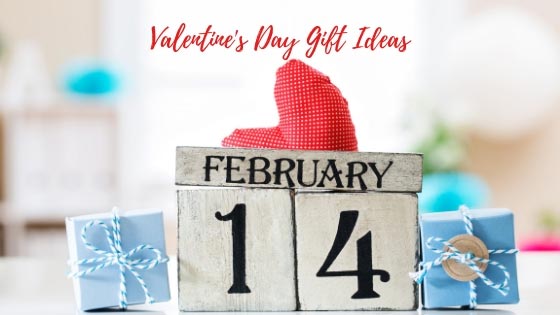 Valentine's Day Gift Ideas heading and below it is a heart shape cushion on top of a February 14 calendar with two mini gift boxes beside it